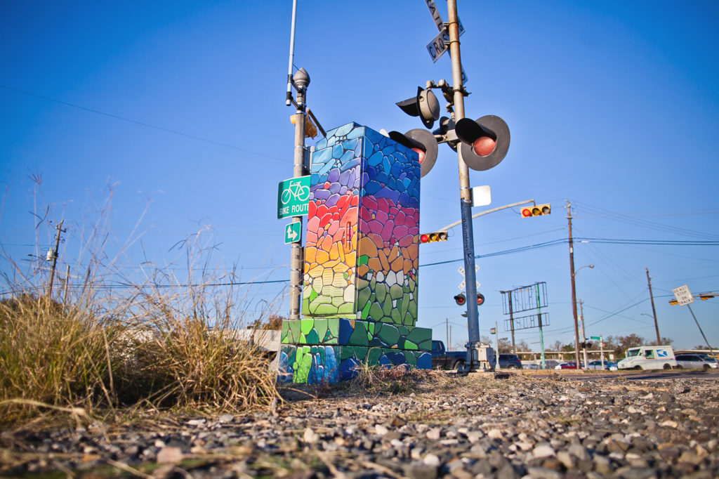 Daniel Anguilu at La Familia Meat Market Houston Mural Map
